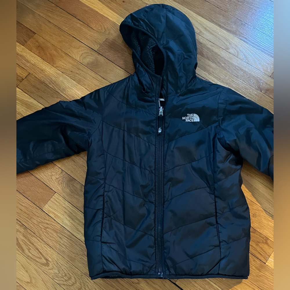 Children’s black  North Face jacket.